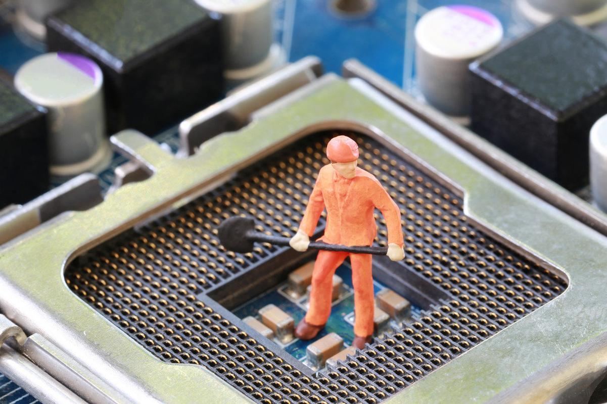 A miner working at a computer