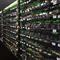 A bustling mining farm hosting optimized machines, illustrating efficient setup and management for various cryptocurrencies